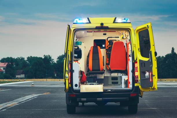 Ambulance car of the emergency medical service at night. Transport Médical Lyon